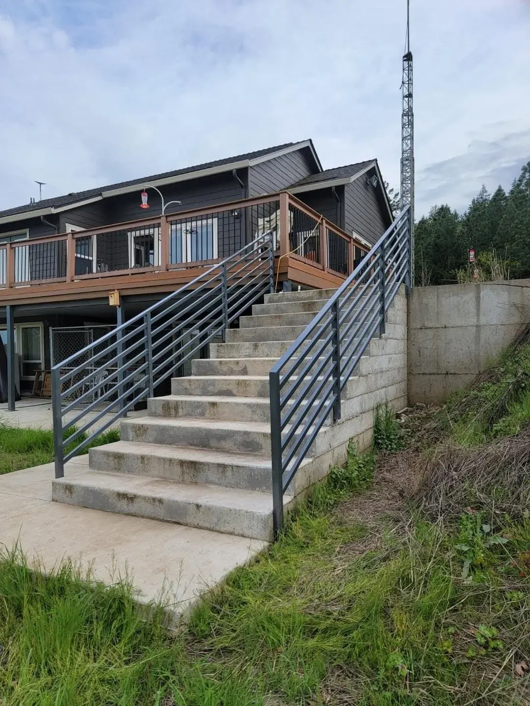 The railings along the outdoor stair.