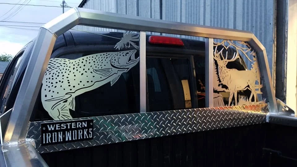 The trout and elk panels above the truck bed.