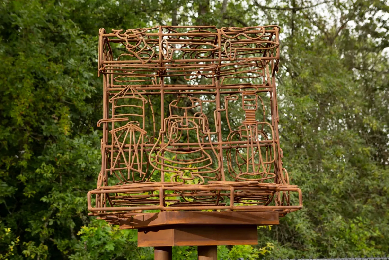Front detail of Advance, with railroad-related forms outlined within the oversized track section.