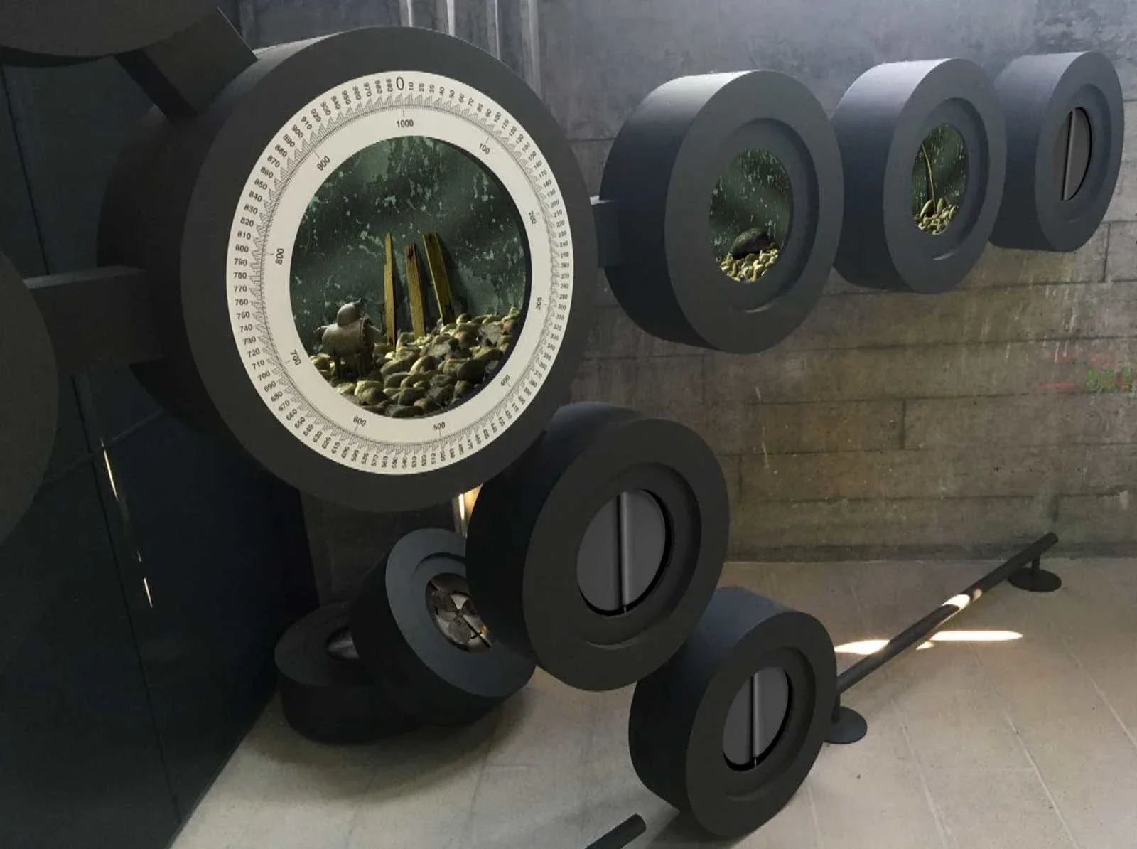 Close view of Mechanism showing a scene playing inside its large central circular display and several smaller displays.