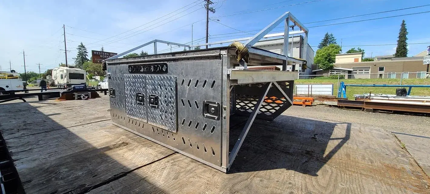 Custom hunting dog truck box with perforated panels and access doors