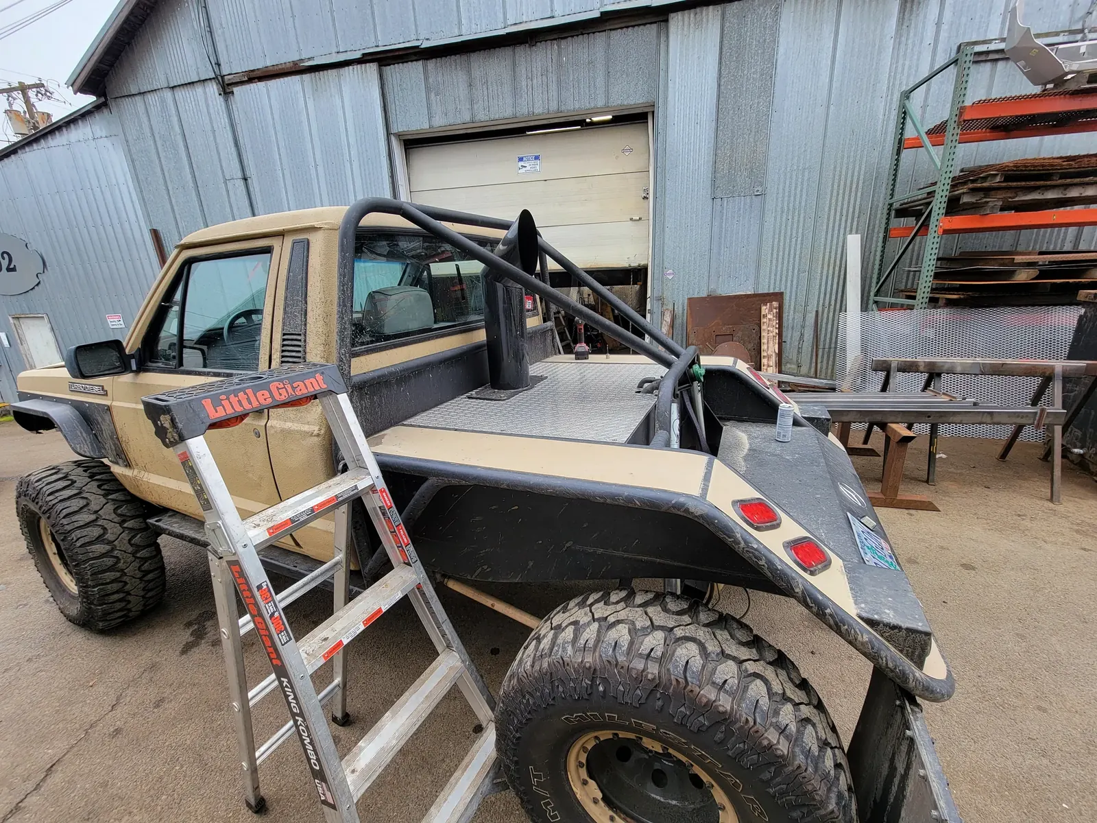 Rear three-quarter view of the custom Jeep flatbed