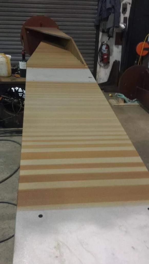 Layered bands across a metal panel.